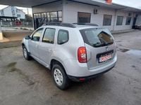 Second-hand Dacia Duster 100 CP (73 kW) 2014 Gri SUV