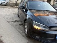 Second-hand VW Jetta 105 CP (77 kW) 2012 Negru Berlinǎ