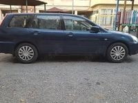 Second-hand Mitsubishi Lancer Invite 98 CP (72 kW) 2005 Negru Berlinǎ