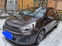 Second-hand Kia Rio FIFA World Cup Edition 109 CP (80 kW) 2013 Culoaremaro Hatchback
