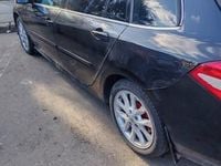 Second-hand Renault Laguna III 110 CP (80 kW) 2009 Negru Hatchback