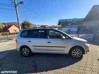 Second-hand VW Touran Comfortline 105 CP (77 kW) 2013 Culoareargint Monovolum