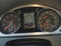 Second-hand VW Passat 140 CP (102 kW) 2012 Negru Hatchback