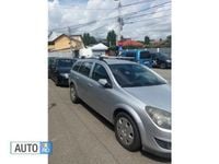 Second-hand Opel Astra 110 CP (80 kW) 2011 Argintiu Break