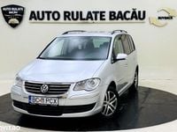 Second-hand VW Touran 105 CP (77 kW) 2008 Culoarenegru Monovolum