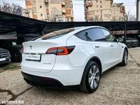 Second-hand Tesla Model Y 378 kW (514 CP) 2024 Culoarealb SUV