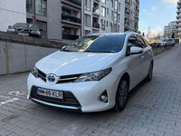 Second-hand Toyota Auris Hybrid Luna 99 CP (72 kW) 2014 Culoarealb Break