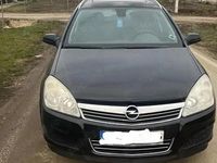 Second-hand Opel Astra 101 CP (74 kW) 2010 Negru Break