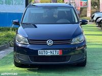 Second-hand VW Touran 110 CP (80 kW) 2013 Culoarealbastru Monovolum
