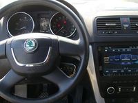 Second-hand Skoda Yeti 77 CP (56 kW) 2010 Argintiu SUV
