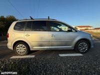 Second-hand VW Touran 140 CP (102 kW) 2011 Culoareargint Monovolum