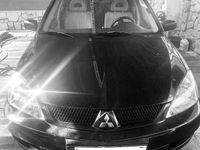 Second-hand Mitsubishi Lancer 102 CP (75 kW) 2008 Negru Berlinǎ