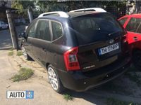 Second-hand Kia Carens 115 CP (84 kW) 2011 Negru Monovolum