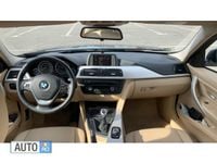 Second-hand BMW 318 Comfort Edition 143 CP (105 kW) 2013 Negru Berlinǎ