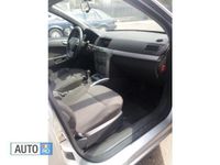 Second-hand Opel Astra 110 CP (80 kW) 2011 Argintiu Break