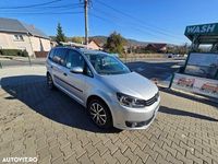Second-hand VW Touran Comfortline 105 CP (77 kW) 2013 Culoareargint Monovolum