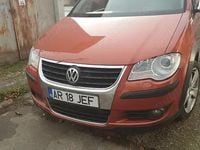Second-hand VW Touran 140 CP (102 kW) 2008 Portocaliu Monovolum