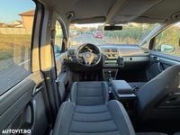 Second-hand VW Touran 140 CP (102 kW) 2011 Culoareargint Monovolum