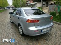 Second-hand Mitsubishi Lancer 109 CP (80 kW) 2008 Gri Berlinǎ