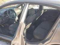 Second-hand Opel Corsa Selection 70 CP (51 kW) 2012 Culoaremaro Hatchback