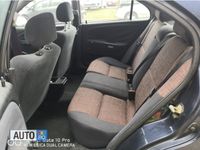 Second-hand Mitsubishi Carisma 101 CP (74 kW) 2001 Albastru Hatchback