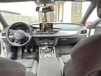 Second-hand Audi A6 190 CP (139 kW) 2014 Culoarealb Hatchback