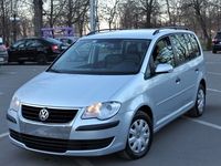 Second-hand VW Touran 131 CP (96 kW) 2008 Argintiu Monovolum