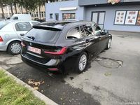 Second-hand BMW 320e 204 CP (150 kW) 2022 Negru Break