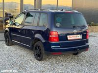 Second-hand VW Touran Comfortline 140 CP (102 kW) 2006 Culoarealbastru Monovolum