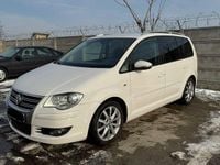 Second-hand VW Touran R-line Edition 140 CP (102 kW) 2010 Culoarealb Monovolum