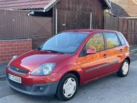 Second-hand Ford Fiesta 75 CP (55 kW) 2006 Roşu Hatchback