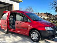 Second-hand VW Caddy 75 CP (55 kW) 2009 Culoarerosu Monovolum