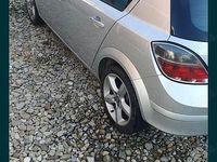 Second-hand Opel Astra 115 CP (84 kW) 2010 Argintiu Hatchback