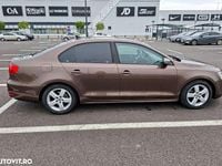 Second-hand VW Jetta Highline 105 CP (77 kW) 2012 Culoaremaro Berlinǎ