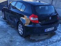 Second-hand BMW 116 115 CP (84 kW) 2006 Negru Hatchback