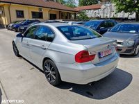 Second-hand BMW 318 143 CP (105 kW) 2007 Argint Berlinǎ