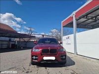 Second-hand BMW X6 235 CP (172 kW) 2009 Culoarerosu SUV
