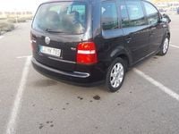 Second-hand VW Touran Highline 136 CP (100 kW) 2004 Negru Monovolum