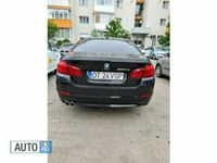 Second-hand BMW 520 186 CP (136 kW) 2010 Negru Berlinǎ