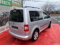 Second-hand VW Caddy 75 CP (55 kW) 2013 Argintiu Monovolum