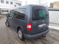 second-hand VW Caddy 2005 usi pe ambele parti