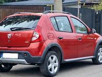 Second-hand Dacia Sandero Stepway 90 CP (66 kW) 2011 Roșu Hatchback