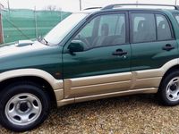 Second-hand Suzuki Grand Vitara 109 CP (80 kW) 2003 Verde metalizat SUV