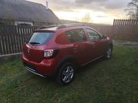 Second-hand Dacia Sandero Stepway 90 CP (66 kW) 2015 Roşu Berlinǎ