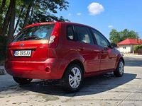 Second-hand Ford Fiesta Ambiente 68 CP (50 kW) 2007 Culoarerosu Hatchback