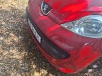 Second-hand Peugeot 107 68 CP (50 kW) 2007 Rosu Hatchback