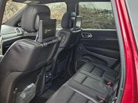 Second-hand Jeep Grand Cherokee Summit 250 CP (183 kW) 2015 Culoarerosu SUV