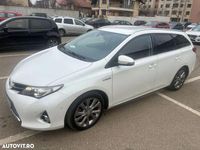 Second-hand Toyota Auris Hybrid 99 CP (72 kW) 2014 Culoarealb Break