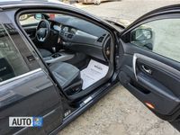 Second-hand Renault Laguna III 150 CP (110 kW) 2010 Negru Break