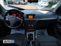 Second-hand Opel Astra 110 CP (80 kW) 2009 Argintiu Break